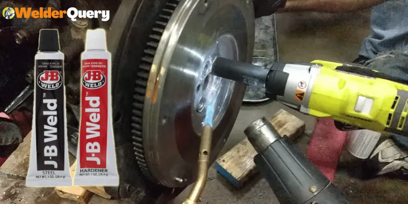 Carefully removing epoxy from a delicate plastic surface using a non-marring tool.