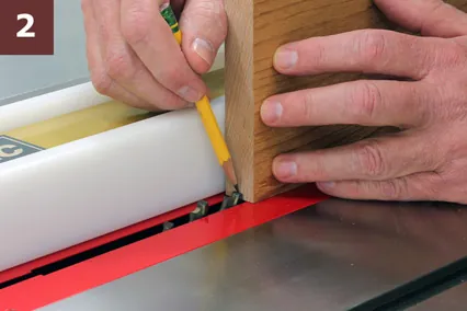 A circular saw and straight-edge guide positioned on a large plywood sheet.