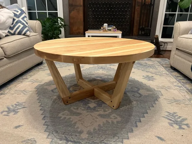 Close up of a solid wood table joint showing high quality construction details.