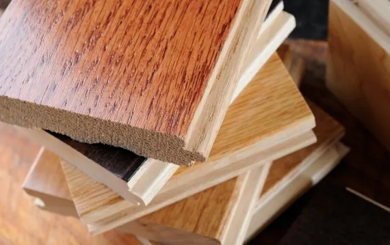 Comparing solid wood grain against a laminate surface for long-lasting furniture projects.