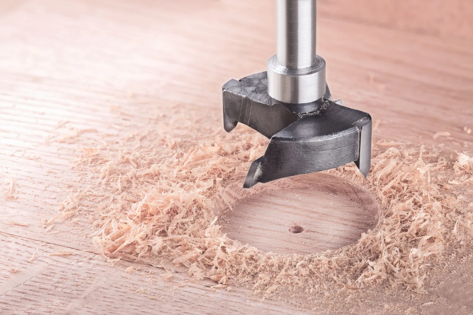 Drill bits and hole saws used for smaller openings in wood.