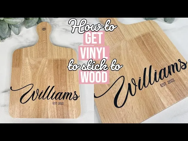 Essential materials for applying vinyl to wood laid out on a table.