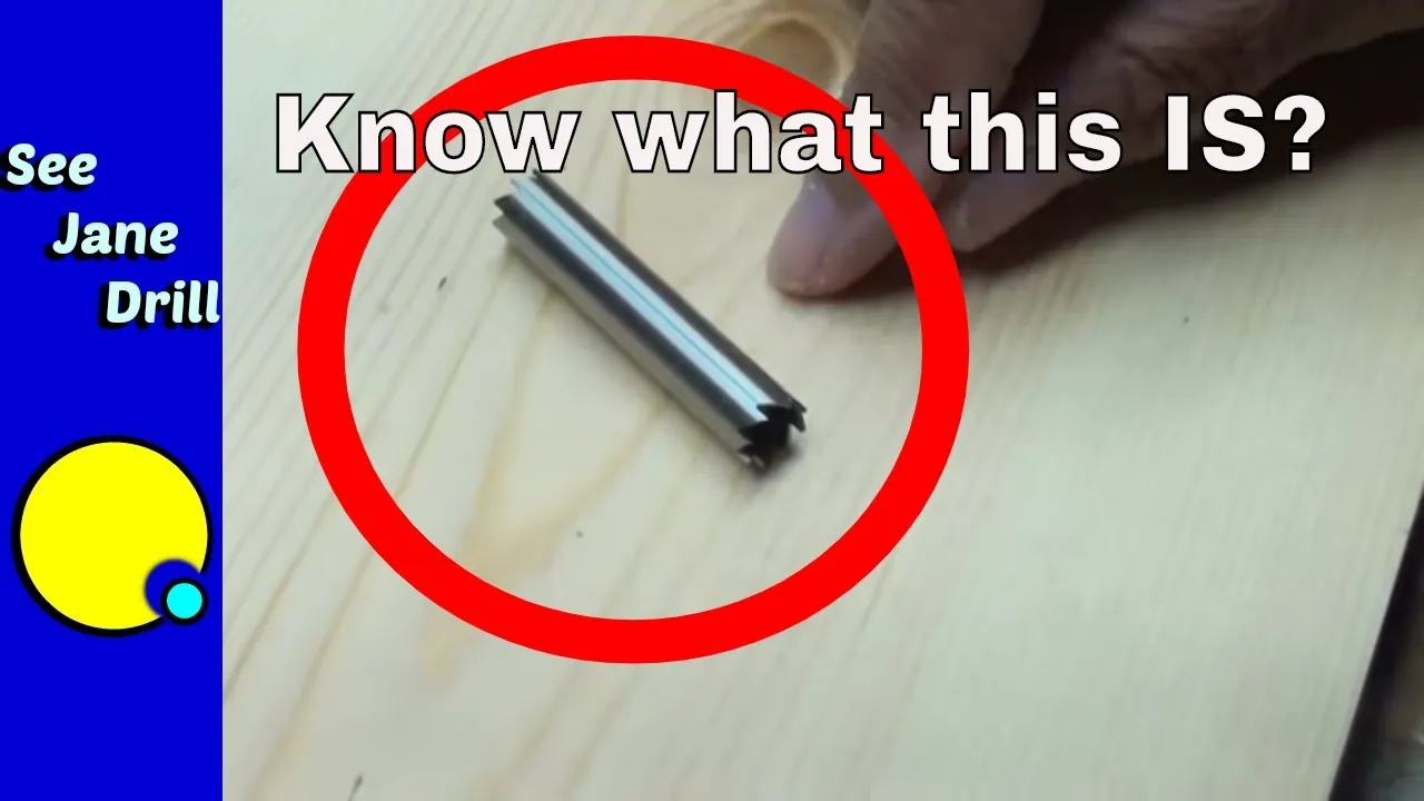Essential tools for removing a headless screw neatly organized on a clean wooden bench.