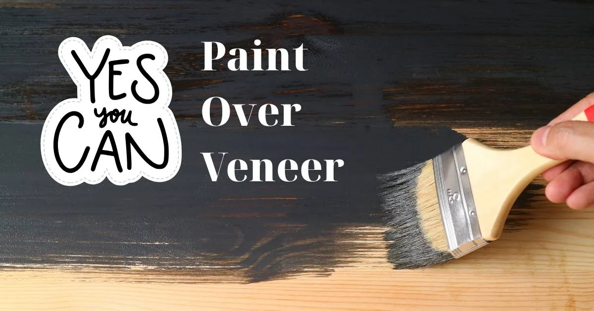 Hand-sanding a piece of wood veneer furniture with a small sanding block.