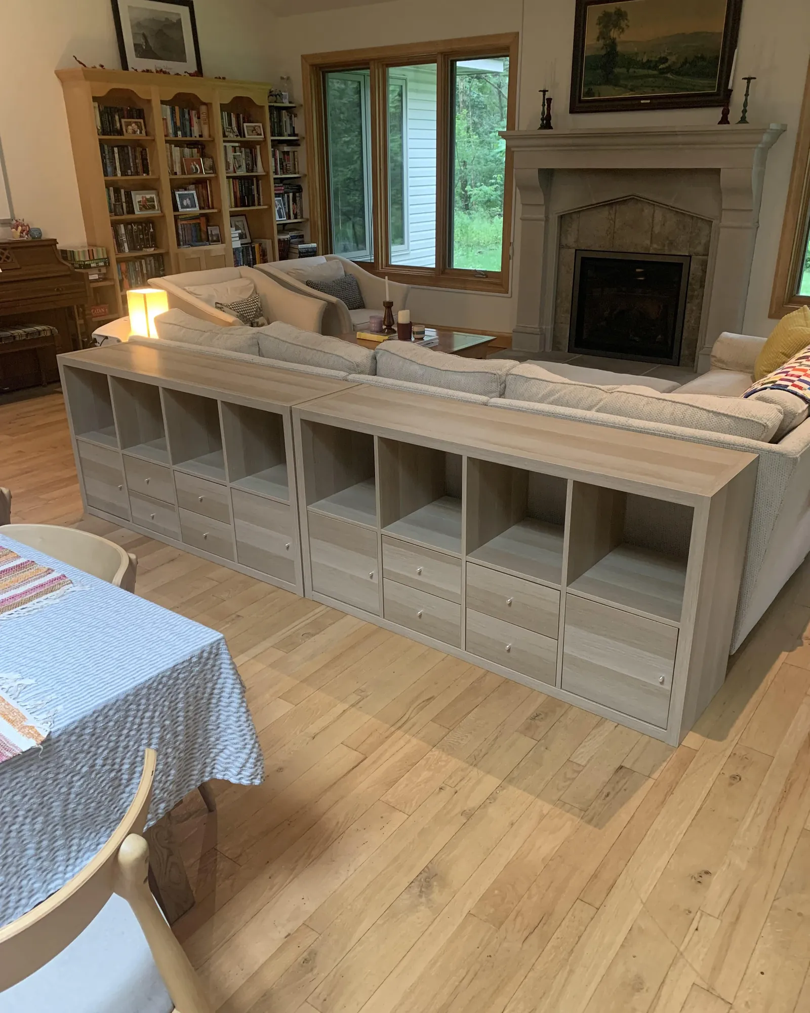 Maintaining stained furniture with a soft cloth and mild soap in a clean home.