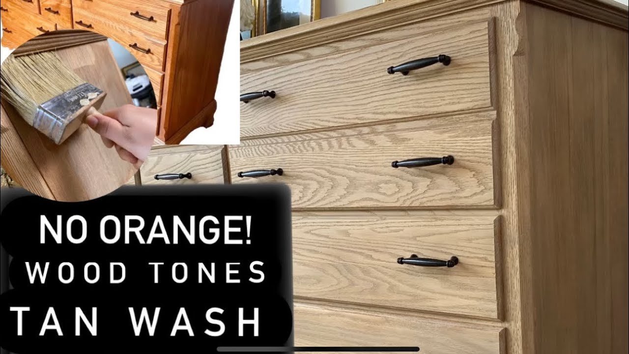 An oak tabletop showing the difference between orange-tinted finish and raw wood.