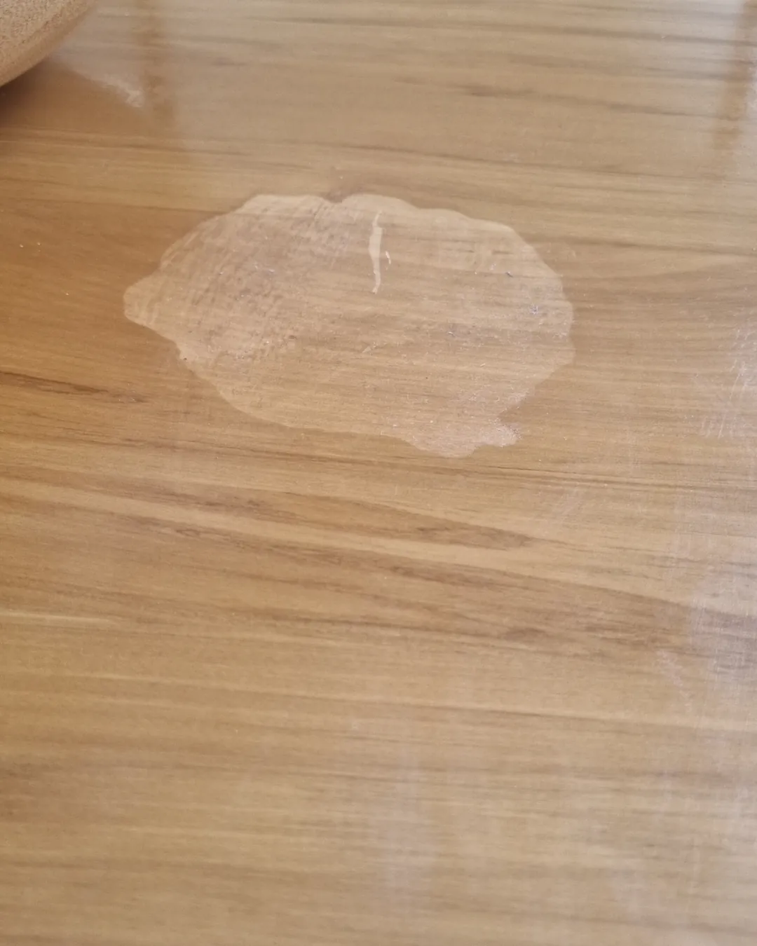 Prepared workspace with protective tray and cloth to prevent acetone damage.