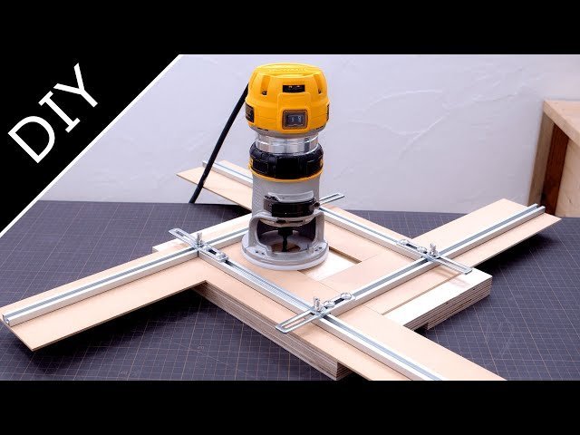 A professional plunge router sitting on oak timber for a woodworking project.