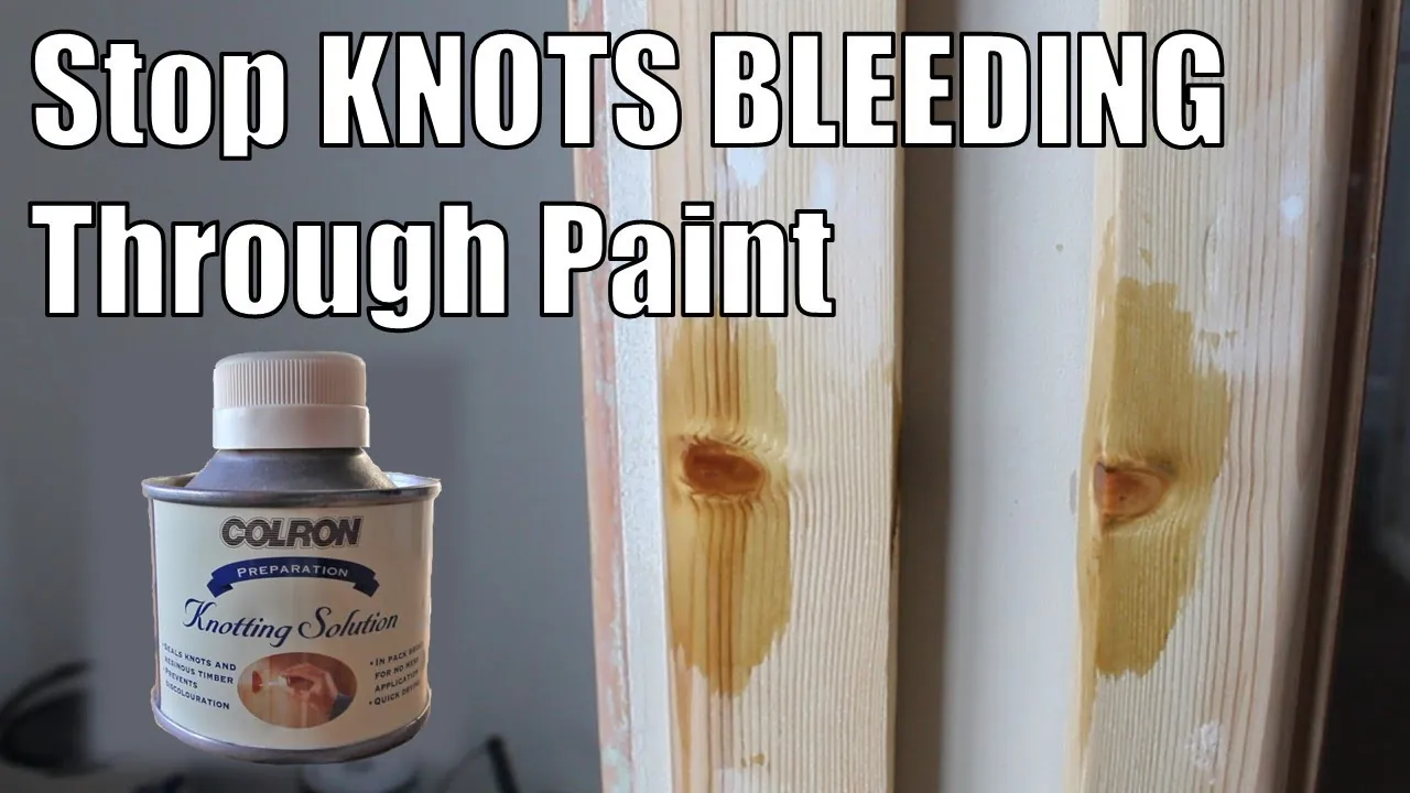 A screwdriver testing wood for structural rot before attempting to paint it.