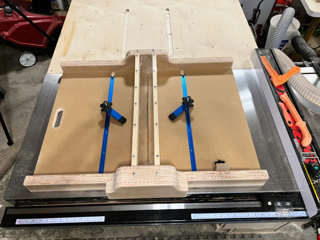 Stopping work on a table saw because of smoke caused by cutting medium-density fiberboard.