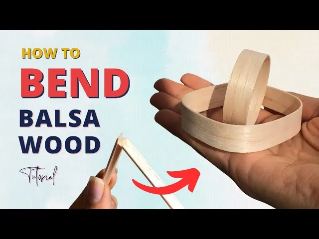 Thick balsa wood is being softened by steam to prepare it for bending.