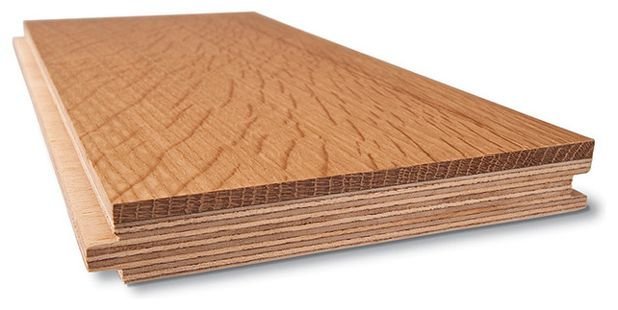 A variety of manufactured wood samples displayed on a workbench for DIY projects.