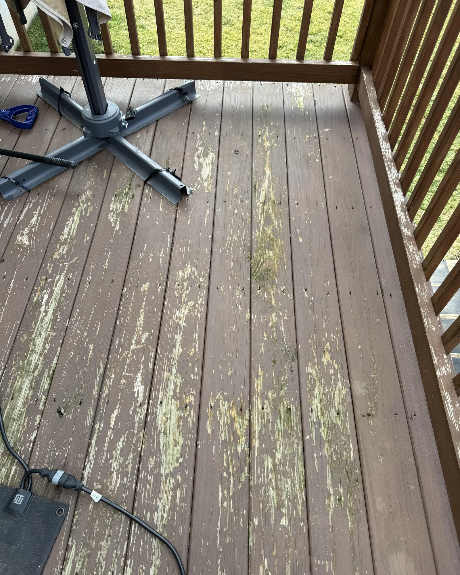 Well-maintained wooden deck showing durable finish and clean wood grain texture.